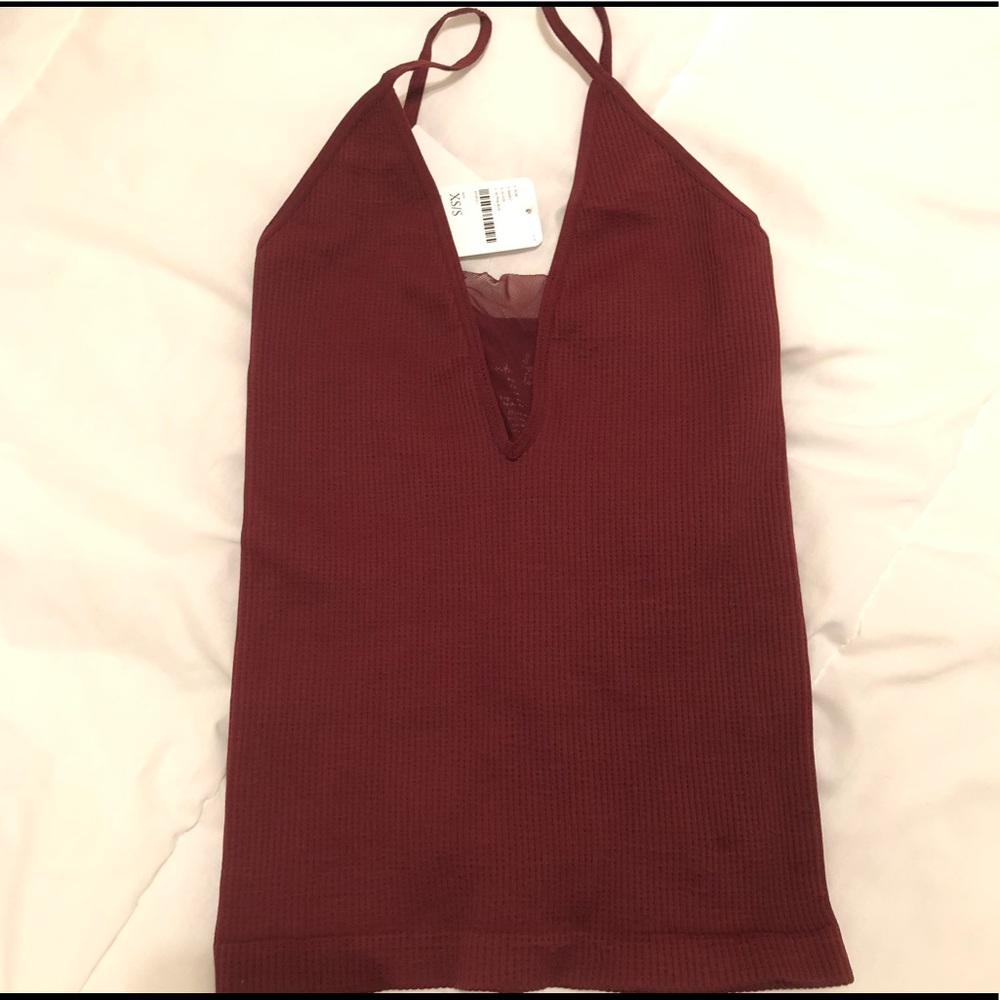 NWT Free People burgundy spaghetti strap top.